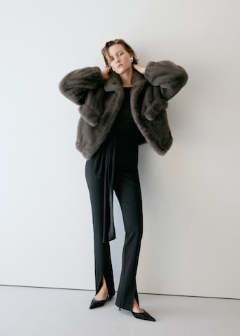 MANGO Skinny Trousers 'POCKET' in Black: front