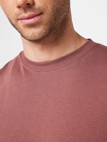 Sweat-shirt 'Dean Sweat' ABOUT YOU en rouge