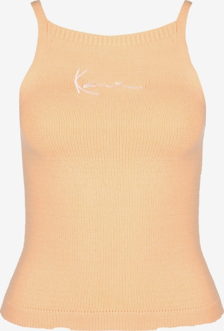 Karl Kani Top 'Small Signature Knit 90s' in Orange: front