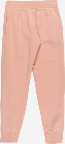 Nike Sportswear Tapered Nadrág 'Club Fleece' - rózsaszín