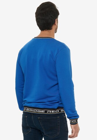 Redbridge Pullover 'Ontario' mit Brandlogo am Bundabschluss in Blau