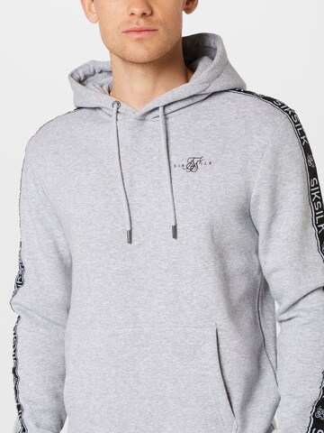 SikSilk - Ropa para correr en gris