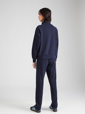 Champion Authentic Athletic Apparel Tracksuit in Blue