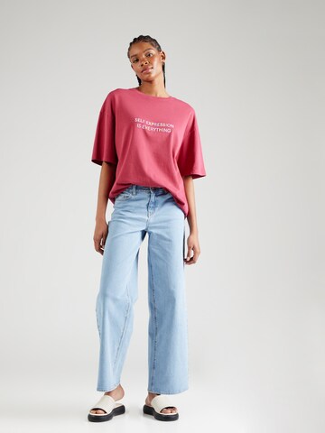 florence by mills exclusive for ABOUT YOU - Camiseta talla grande 'Contentment' en rosa