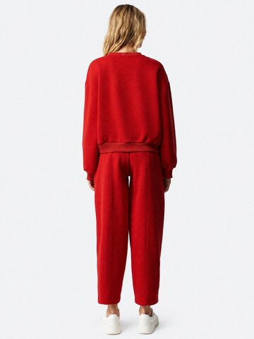 Pantalon 'Jogginghose' Ethiquet en rouge
