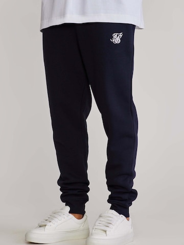 Coupe slim Pantalon de sport 'Essentials' SikSilk en bleu : devant