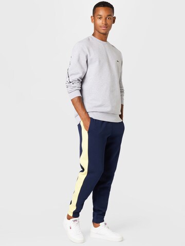 LACOSTE Конический (Tapered) Штаны в Синий