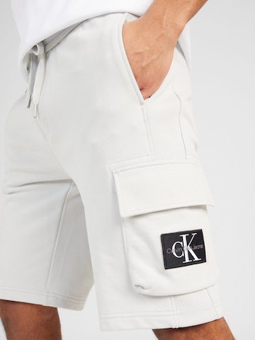 Regular Pantaloni cu buzunare de la Calvin Klein Jeans pe gri