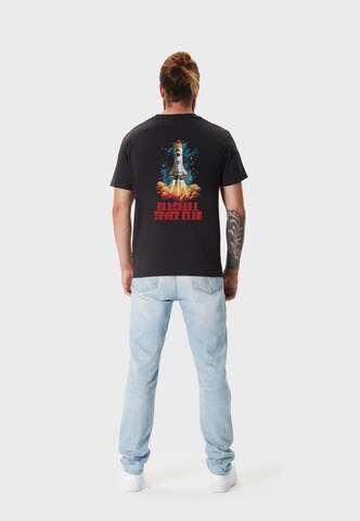 Oldskull Shirt 'Wrldvibe Space Rocket Launch Graphic' in Black
