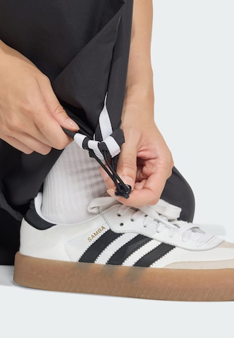 ADIDAS ORIGINALS Wide leg Broek 'Adillenium' in Zwart