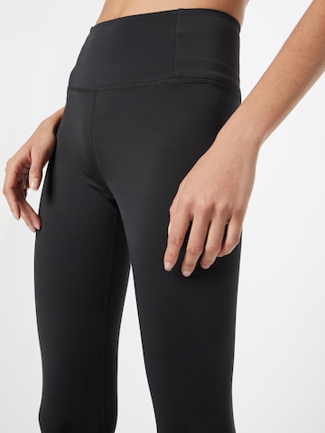 Girlfriend Collective Skinny Športne hlače | črna barva