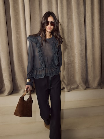 Flared Pantaloni di Bhoem in nero
