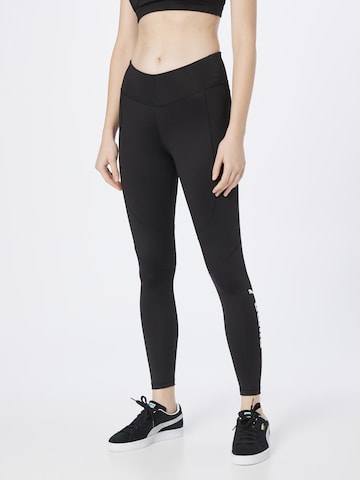 PUMA Skinny Workout Pants in Black: front