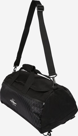 Calvin Klein Jeans Cestovní taška – černá: přední strana