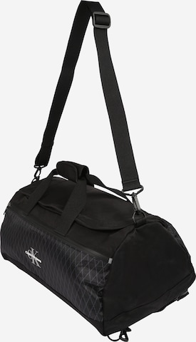 Calvin Klein Jeans - Bolsa de viaje en negro: frente