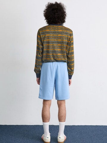 Loosefit Pantalon 'Essential' ADIDAS ORIGINALS en bleu : derrière