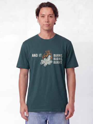 T-Shirt 'And It Burns' Watapparel en bleu : devant
