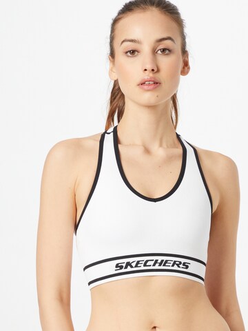 Bustino Reggiseno sportivo di SKECHERS in bianco: frontale