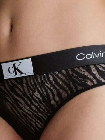 Calvin Klein Underwear Tanga – černá