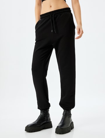 Koton Tapered Hose in Schwarz: Vorderseite