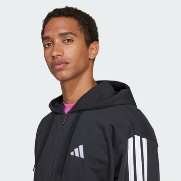 ADIDAS SPORTSWEAR Urheilullinen collegetakki 'Essentials' värissä musta