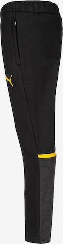 PUMA Slim fit Workout Pants ' Borussia Dortmund' in Black
