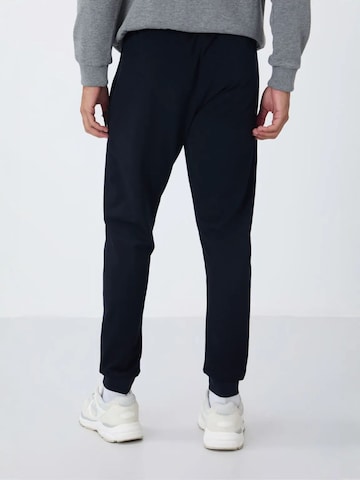 Regular Pantalon de sport Tommy Life en noir