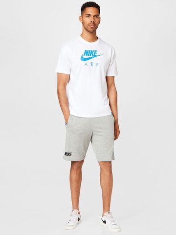 Nike Sportswear Loose fit Pants in Grey