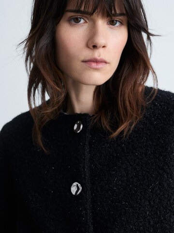Veste mi-saison 'MELCA' MANGO en noir