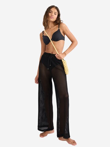 TRIUMPH Loose fit Trousers ' Red Label Beach MyWear ' in Black