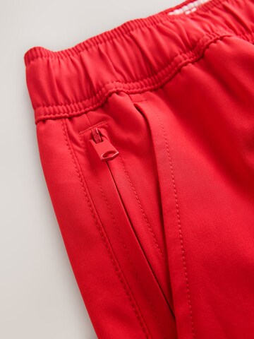 Shorts de bain 'Essential Motion-Flex' Next en rouge