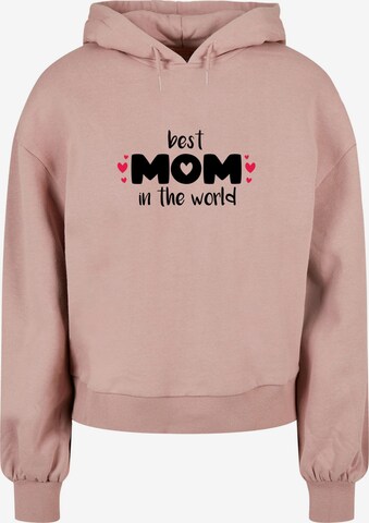Merchcode Sweatshirt 'Mothers Day - Best Mom In The World' in Roze: voorkant