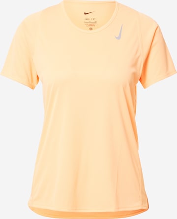 NIKE Koszulka funkcyjna w kolorze pomarańczowy: przód
