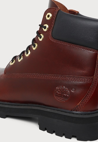 TIMBERLAND - Botas com atacadores em vermelho