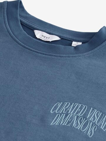 T-Shirt Next en bleu