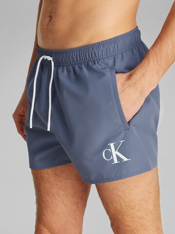 Pantaloncini da bagno di Calvin Klein Swimwear in grigio