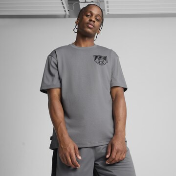PUMA Performance shirt 'Posterize' in Grey