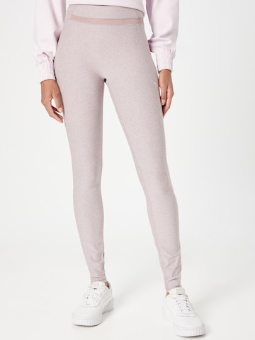 Skinny Pantalon de sport PUMA en violet : devant