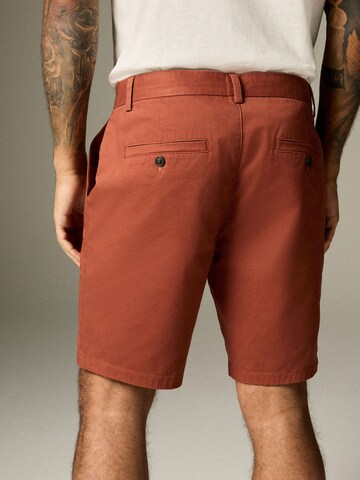 Next - regular Pantalón chino en rojo