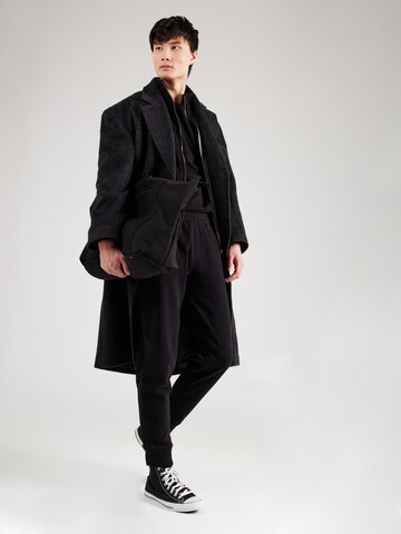 Superdry Tapered Broek 'Essential' in Zwart