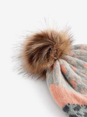Bonnet Next en beige