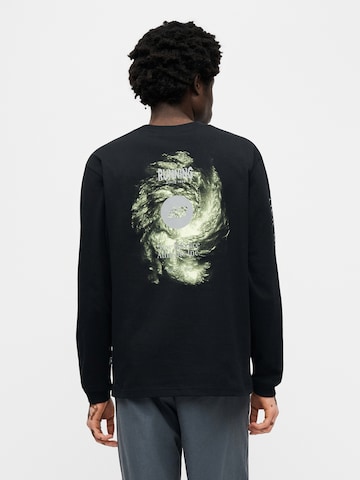 new balance T-shirt i svart: framsida