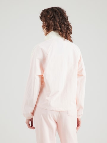 Geacă de primăvară-toamnă de la Reebok pe roz