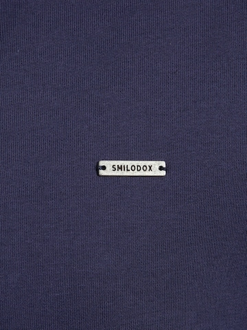 Veste de survêtement 'Jago' Smilodox en bleu