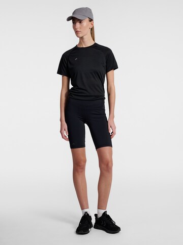 Newline Slim fit Sports trousers 'Race' in Black