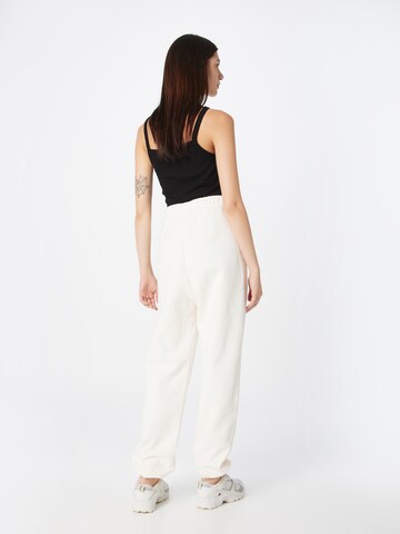 Effilé Pantalon Tommy Jeans en blanc