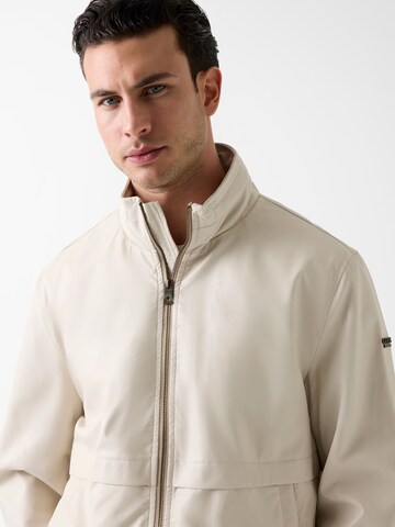 GUESS Between-Season Jacket in Beige