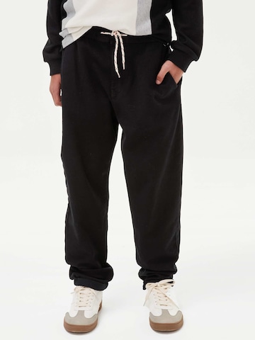 Marks & Spencer Regular Trousers in Black: front