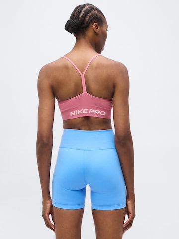 NIKE - Soutien Bustier Soutien de desporto 'Nike Pro' em rosa