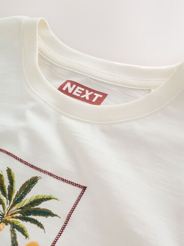 T-Shirt Next en blanc